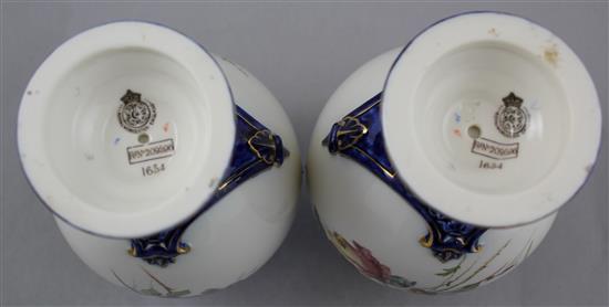 A pair of Royal Worcester ovoid two handled vases, c.1897, 19.5cm